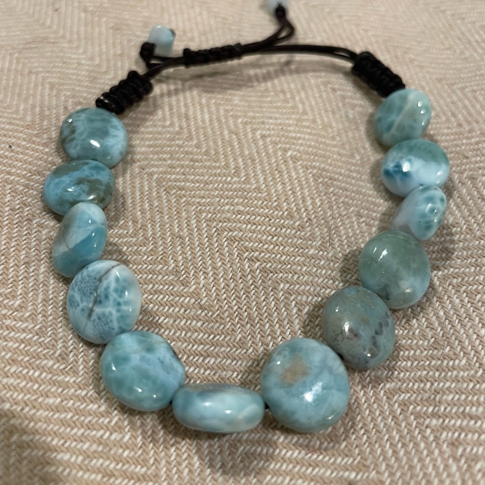 Adjustable turquoise bracelet.